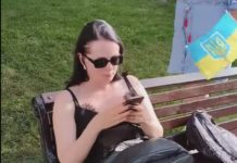 Львівська експосадовиця, яка відмовилась встати під час гімну, подає до суду на волонтерку